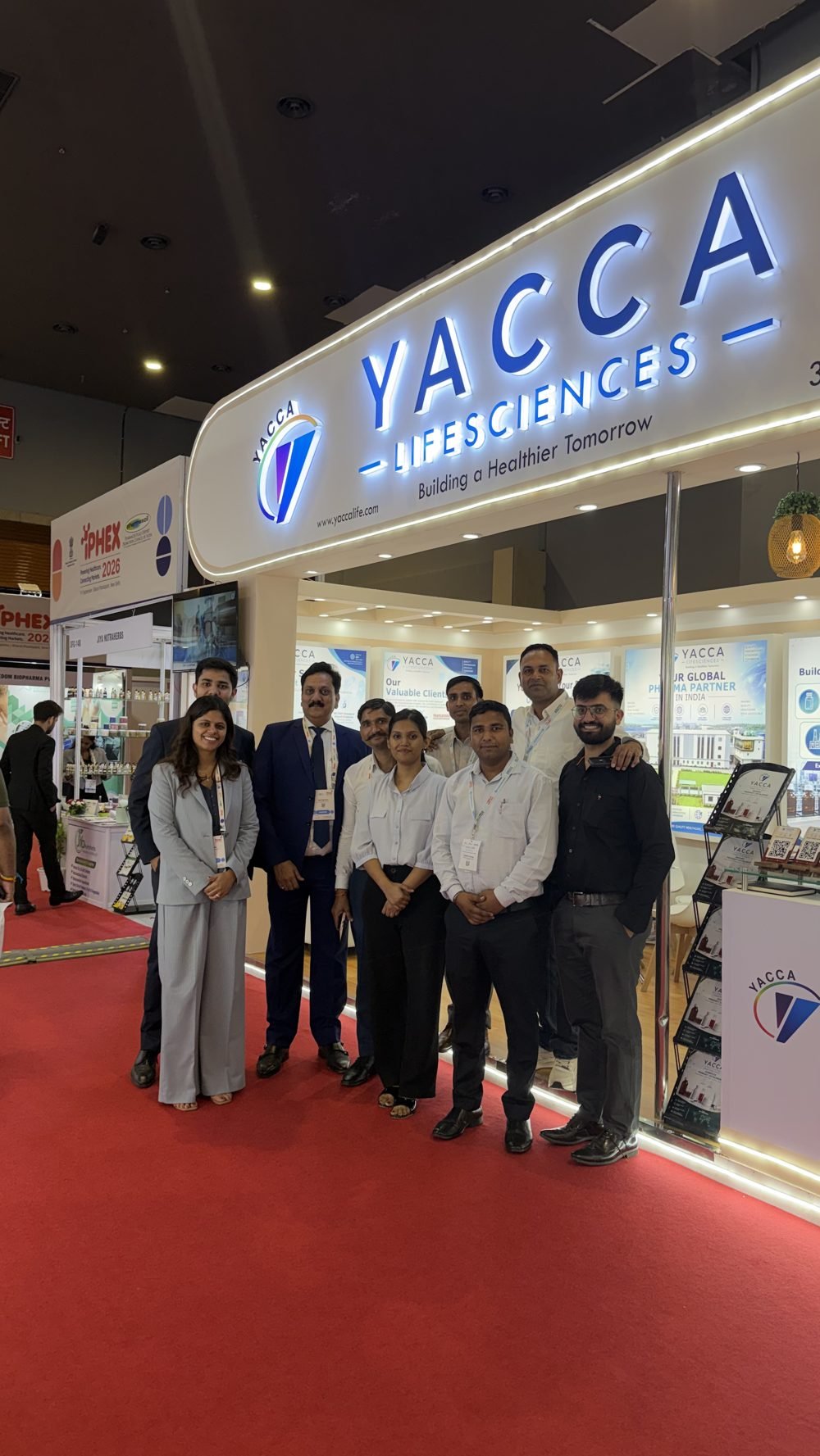 Full Yacca Lifesciences team at the IPHEX 2026 booth entrance